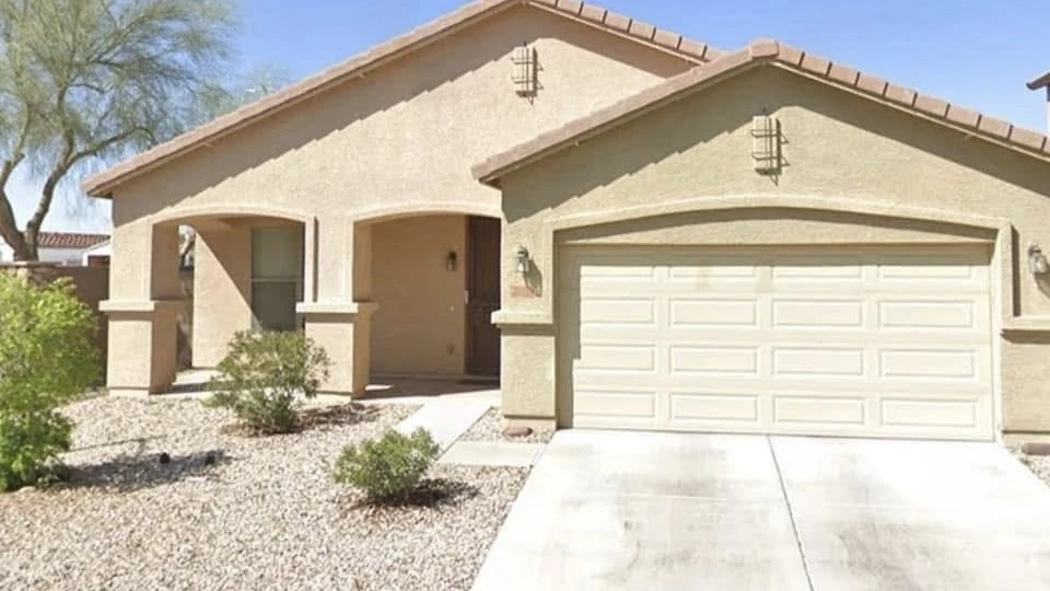 Before: tan stucco home in Peoria AZ prior to exterior repaint by Reyes Industry Painting